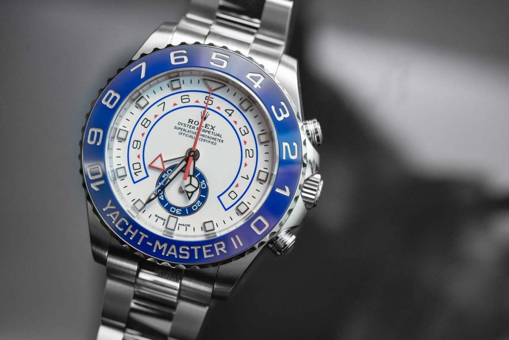 Rolex Yacht-Master II 116680 fake watch features a blue ceramic bezel and white dial.