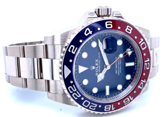 Swiss Rolex fake watches offer GMT function and luxury white gold material.